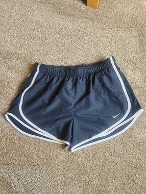 NWOT Nike Women's Dark Blue Athletic Shorts with White Trim